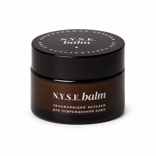 Confezione nera di NYSE Balm, balsamo idratante per la cura della pelle secca e danneggiata.