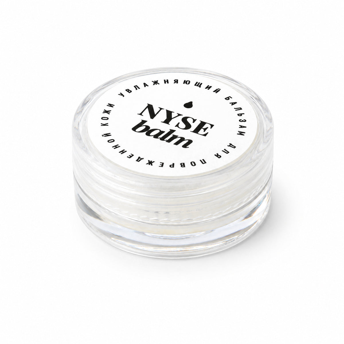 Vasetto trasparente chiuso di NYSE Balm con etichetta bianca e logo nero.